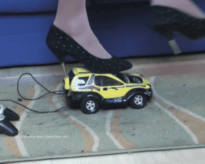 Car Crushed Under Spiked High-heeled slippers